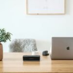 Home-office workspace illustrating small-device backup power planning; not a BLUETTI product photograph