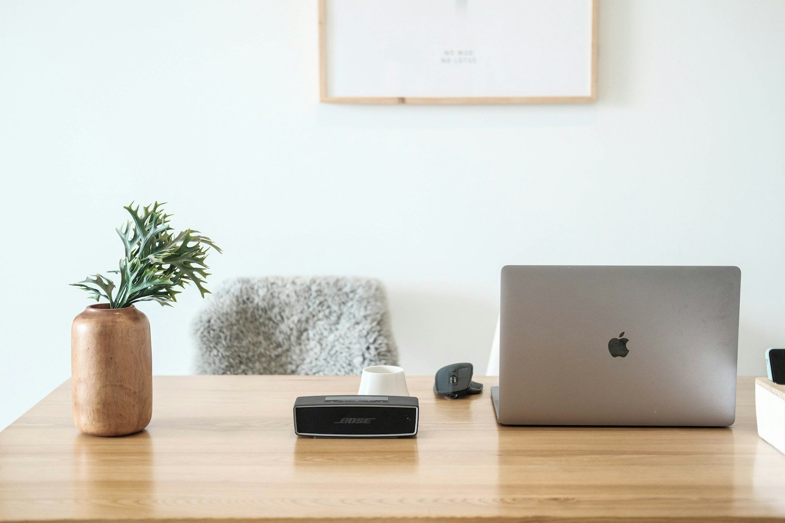 Home-office workspace illustrating small-device backup power planning; not a BLUETTI product photograph