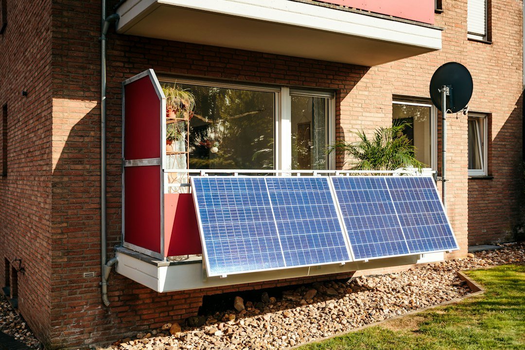 Small balcony solar panels installed on an apartment railing