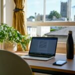 Home-office workspace illustrating a measured electronics backup-load plan