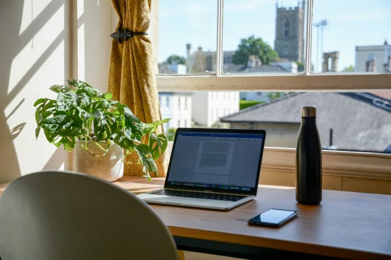 Home-office workspace illustrating a measured electronics backup-load plan